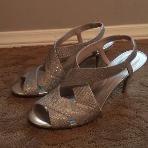 Silver sparkly bandolino heels.